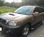 Hyundai Santa Fe Gold 2002 - Nhu cầu đổi xe khác nên gia đình cần bán Santafe 2002 màu đồng, chính chủ, giá 230 tr