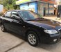 Mazda 323 2004 - Bán Mazda 323 đời 2004, màu đen, xe nhập, giá tốt
