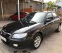 Mazda 323 2004 - Bán Mazda 323 đời 2004, màu đen, xe nhập, giá tốt