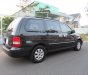 Kia Carnival GS 2.5 MT 2007 - Bán Kia Carnival GS 2.5 MT đời 2007, màu đen ít sử dụng, 236 triệu