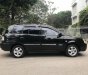 Kia Carens LX 2005 - Cần bán lại xe Kia Carens LX sản xuất 2005, màu đen, nhập khẩu, số tự động
