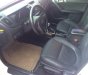Kia Forte AT 2013 - Nhà cần bán xe Kia Forte 2013 AT, màu trắng, xe chính chủ gia đình sử dụng
