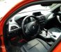 BMW 1 Series  116i  2014 - Chính chủ bán BMW 1 Series 116i đời 2014, màu cam