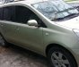 Nissan Grand livina  MT 2011 - Cần bán gấp Nissan Livina 2011, màu vàng cát, còn mới