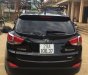 Hyundai Tucson 2011 - Cần bán Hyundai Tucson sản xuất 2011, màu đen, xe nhập