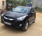 Hyundai Tucson 2011 - Cần bán Hyundai Tucson sản xuất 2011, màu đen, xe nhập