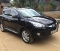 Hyundai Tucson 2011 - Cần bán Hyundai Tucson sản xuất 2011, màu đen, xe nhập