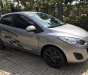 Mazda 2 2013 - Chính chủ nữ cần bán Mazda 2 SX 2013, còn rất mới, màu bạc, giá 395tr