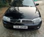 Kia Spectra 1.6 MT 2005 - Cần bán xe Kia Spectra 1.6 MT đời 2005, màu đen số sàn