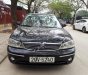 Ford Laser GHIA 1.8 AT 2004 - Cần bán lại xe Ford Laser GHIA 1.8 AT đời 2004, màu đen, giá 236tr