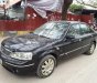 Ford Laser GHIA 1.8 AT 2004 - Cần bán lại xe Ford Laser GHIA 1.8 AT đời 2004, màu đen, giá 236tr