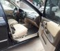 Ford Laser GHIA 1.8 AT 2004 - Cần bán lại xe Ford Laser GHIA 1.8 AT đời 2004, màu đen, giá 236tr
