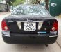 Ford Laser GHIA 1.8 AT 2004 - Cần bán lại xe Ford Laser GHIA 1.8 AT đời 2004, màu đen, giá 236tr