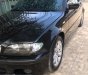 BMW 3 Series 318i  2004 - Bán ô tô BMW 318i năm 2004, màu đen, nhập khẩu nguyên chiếc