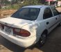 Mazda 323 1.6 MT 2000 - Bán ô tô Mazda 323 1.6 GLX đời 2000, màu trắng 