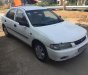 Mazda 323 1.6 MT 2000 - Bán ô tô Mazda 323 1.6 GLX đời 2000, màu trắng 