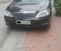 Toyota Camry 2004 - Cần bán gấp Toyota Camry năm 2004, màu đen xe gia đình