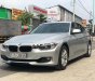 BMW 3 Series 320i 2013 - Bán BMW 3 Series 320i đời 2013, màu bạc, nhập, đẹp như mới