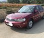 Ford Laser Ghia 1.8 MT 2003 - Cần bán lại xe Ford Laser Ghia 1.8 MT sản xuất 2003, màu đỏ