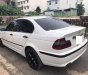 BMW 3 Series 318i 2005 - Cần bán xe BMW 3 Series 318i năm 2005, màu trắng xe gia đình