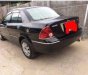 Ford Laser 2005 - Cần bán gấp Ford Laser đời 2005, màu đen, xe nhập chính chủ, giá cạnh tranh