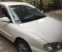 Kia Spectra 2004 - Chính chủ bán Kia Spectra đời 2004, màu trắng