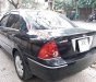 Ford Laser Ghia 1.8 AT 2004 - Bán Ford Laser Ghia 1.8 AT đời 2004, màu đen  