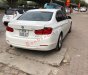 BMW 3 Series 320i 2014 - Cần bán lại xe BMW 3 Series 320i đời 2014, màu trắng, xe nhập