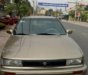 Nissan Bluebird 1992 - Bán Nissan Bluebird đời 1992, màu vàng cát