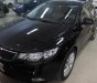 Kia Cerato 1.6 AT 2011 - Cần bán lại xe Kia Cerato 1.6AT đời 2011, màu đen, xe nhập số tự động