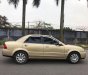 Ford Laser GHIA 1.8 AT 2004 - Cần bán gấp Ford Laser GHIA 1.8 AT năm sản xuất 2004, màu vàng số tự động, 238 triệu