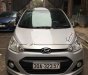 Hyundai Premio 1.0MT 2014 - Cần bán gấp Hyundai Grand i10 1.0MT 2014, màu bạc, nhập khẩu