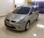 Mitsubishi Grandis 2.4 AT 2009 - Cần bán gấp Mitsubishi Grandis 2.4 AT năm sản xuất 2009, màu vàng  