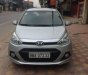 Hyundai Grand i10 2015 - Bán Hyundai Grand i10 năm sản xuất 2015, màu bạc, giá 310tr