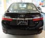 Toyota Corolla altis 1.8E CVT 2018 - Bán Toyota Corolla altis 1.8E CVT sản xuất năm 2018, màu đen, 707tr