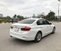 BMW 3 Series  320i 2015 - Cần bán lại xe BMW 3 Series 320i 2015, màu trắng