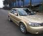 Ford Laser 2004 - Xe Ford Laser sản xuất năm 2004, màu vàng số tự động, giá chỉ 232 triệu