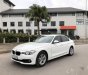 BMW 3 Series  320i 2015 - Cần bán lại xe BMW 3 Series 320i 2015, màu trắng