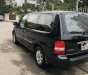 Kia Carnival 2008 - Bán Kia Carnival đời 2008, màu đen số tự động
