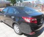 Toyota Vios 2015 - Cần bán gấp Toyota Vios sản xuất năm 2015, màu đen