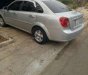 Daewoo Lacetti 2009 - Cần bán gấp Daewoo Lacetti sản xuất năm 2009, màu bạc, 232tr