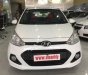 Hyundai Premio  1.0MT 2015 - Bán xe Hyundai Grand i10 1.0MT sản xuất năm 2015, màu trắng, nhập khẩu nguyên chiếc, giá 335tr