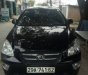 Kia Carens 2009 - Cần bán gấp Kia Carens năm 2009, màu đen