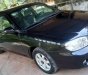 Kia Spectra 2004 - Cần bán lại xe Kia Spectra đời 2004, màu đen, còn mới, giá cạnh tranh