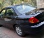 Kia Spectra 2004 - Cần bán lại xe Kia Spectra đời 2004, màu đen, còn mới, giá cạnh tranh