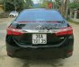 Toyota Corolla altis 2016 - Cần bán Toyota Corolla altis năm sản xuất 2016, màu đen xe gia đình, giá chỉ 690 triệu