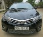 Toyota Corolla altis 2016 - Cần bán Toyota Corolla altis năm sản xuất 2016, màu đen xe gia đình, giá chỉ 690 triệu