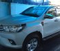 Toyota Hilux 2016 - Bán Toyota Hilux năm 2016, màu trắng, nhập khẩu như mới, 785 triệu