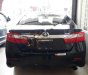 Toyota Camry 2.0E 2014 - Bán Toyota Camry 2.0E sản xuất 2014, màu đen như mới