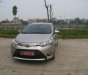 Toyota Vios E 2015 - Bán ô tô Toyota Vios E sản xuất năm 2015, màu vàng cát